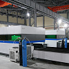 FL-L2060FHE-1000-Raycus Лазерный станок для резки листового металла с кабинетной защитой и сменным столом